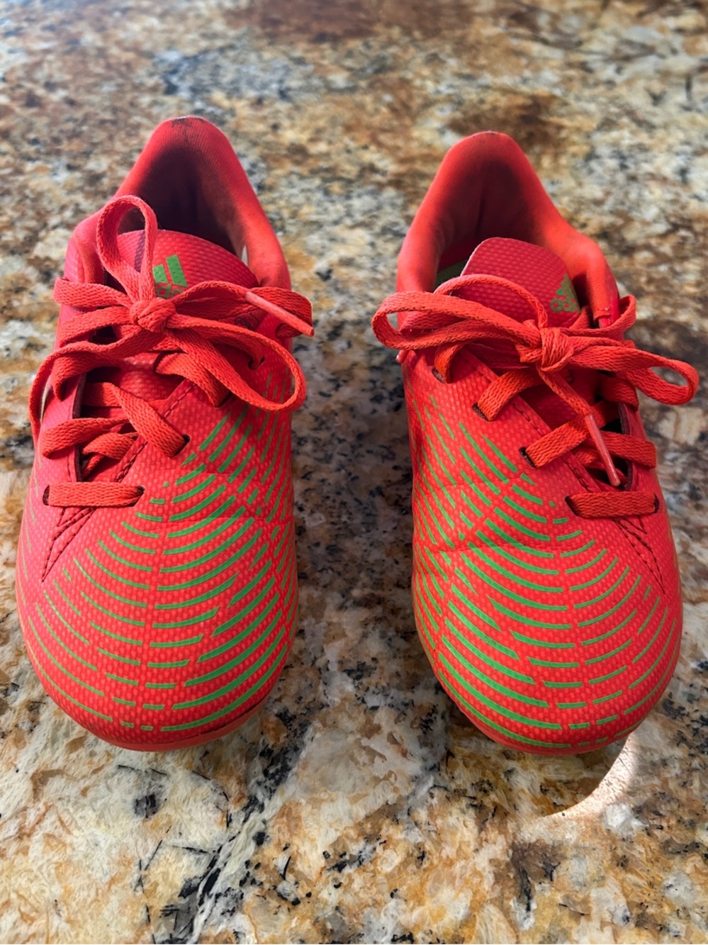 Size 11 adidas Kids orange soccer cleats with Green Stripe Detail